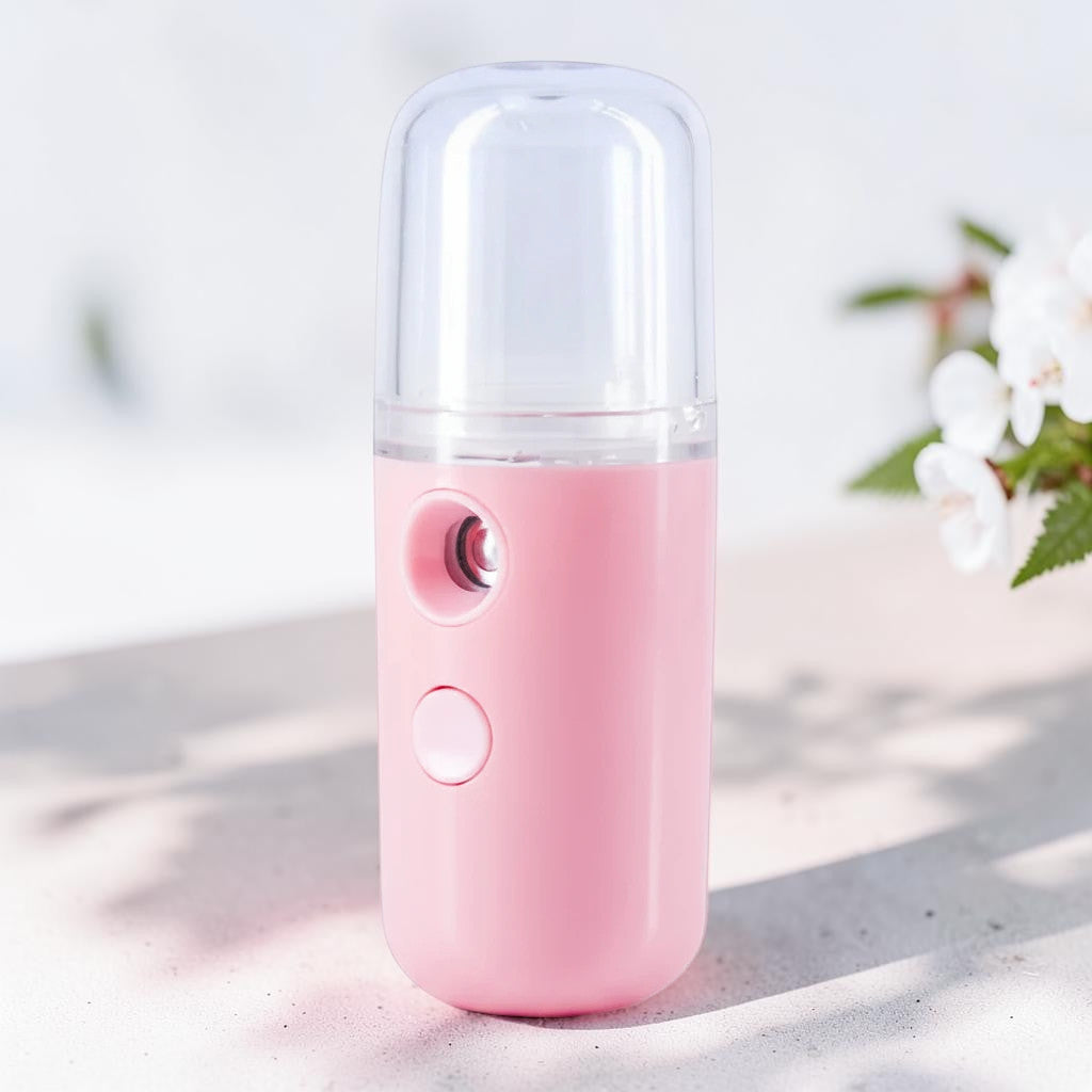 Mole Luxe pembe renkli, taşınabilir nano yüz nemlendirici sprey cihazı, USB şarjlı cilt bakım aleti.