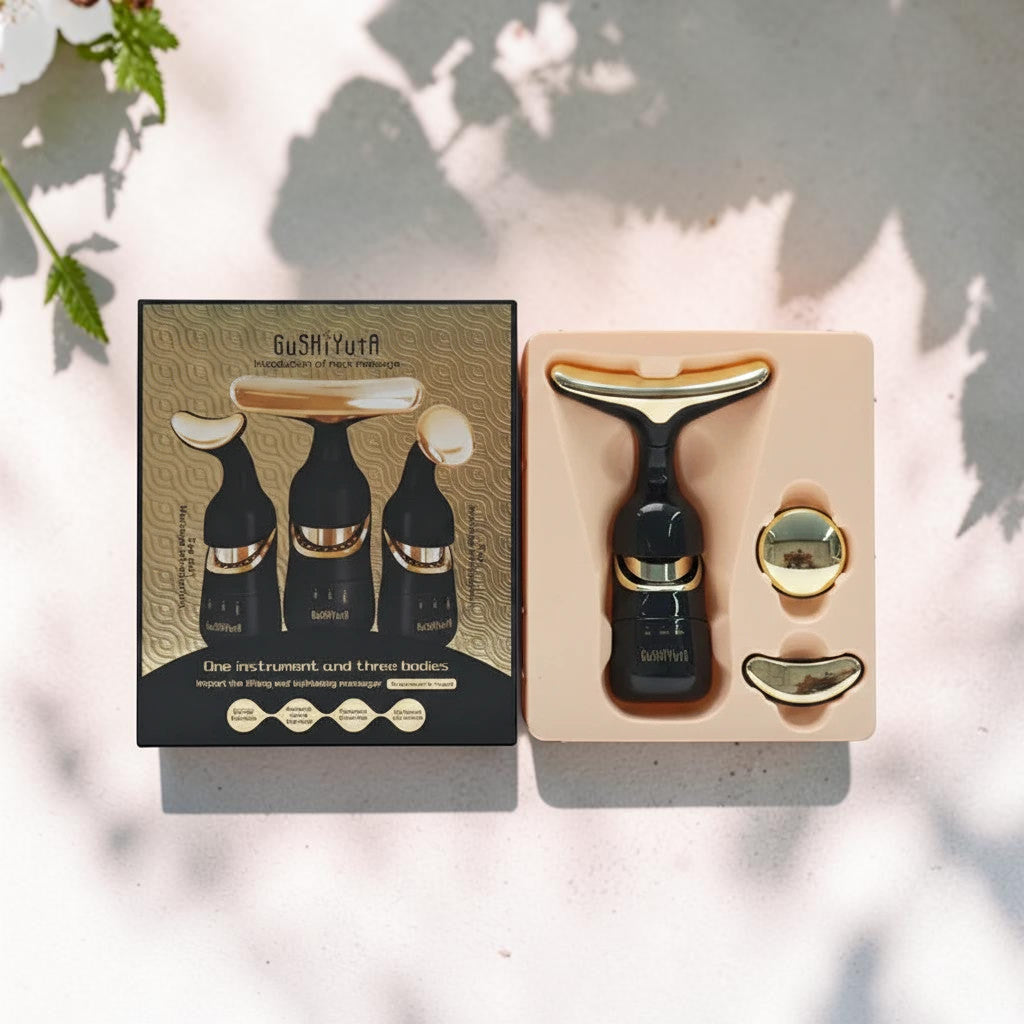 Mole Luxe siyah ve altın renkli, boyun ve yüz için tasarlanmış, değiştirilebilir başlıklı titreşimli masaj cihazı seti